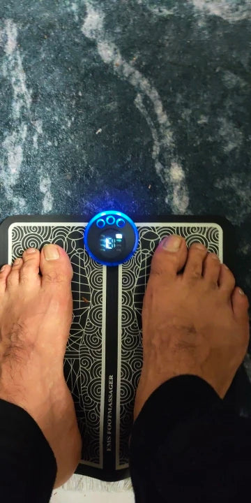 Foto de un cliente usando el masajeador de pies (reseña 28)