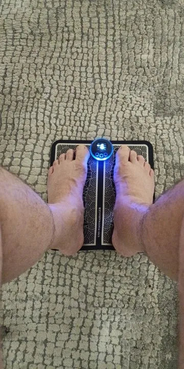 Foto de un cliente usando el masajeador de pies (reseña 34)